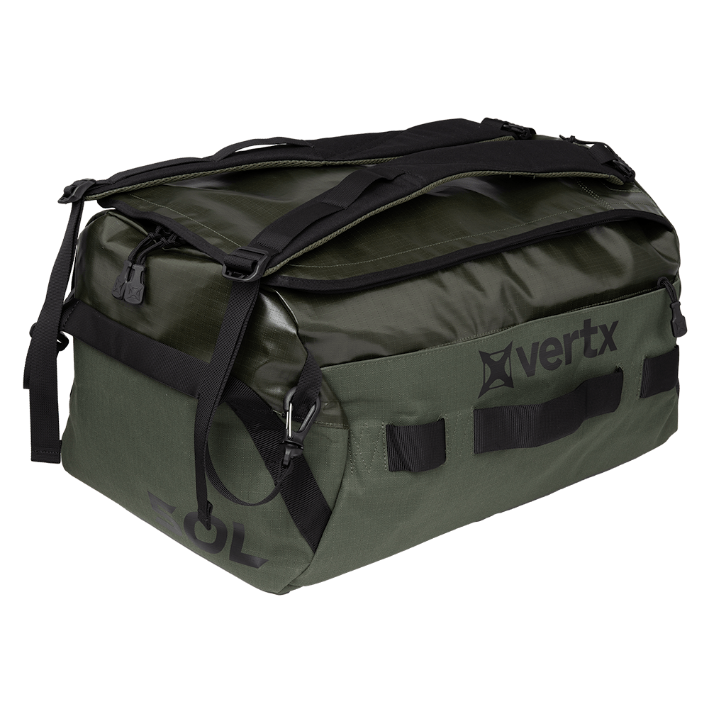 The Vertx RLT Duffel, a distinctive green and black bag displaying the "Vertx" logo on the side, features robust construction with adaptable storage options. Its tough design is enhanced by smooth black straps, zippers, and handles.