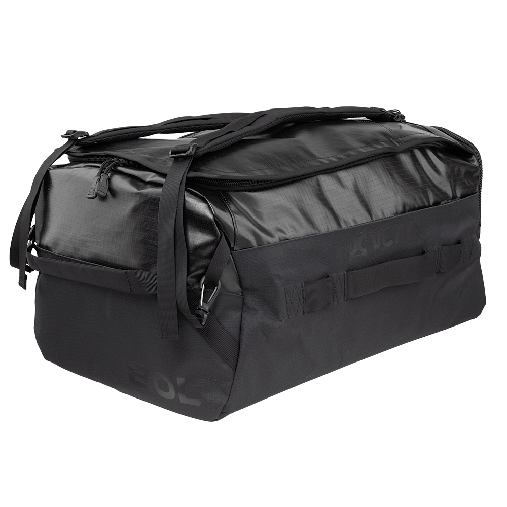 Introducing the Vertx RLT Duffel by Vertx: a sleek black duffel bag featuring a zippered top, dual handles, and a convenient shoulder strap. With its rectangular shape tailored for customizable storage and durable construction, it promises long-lasting performance.