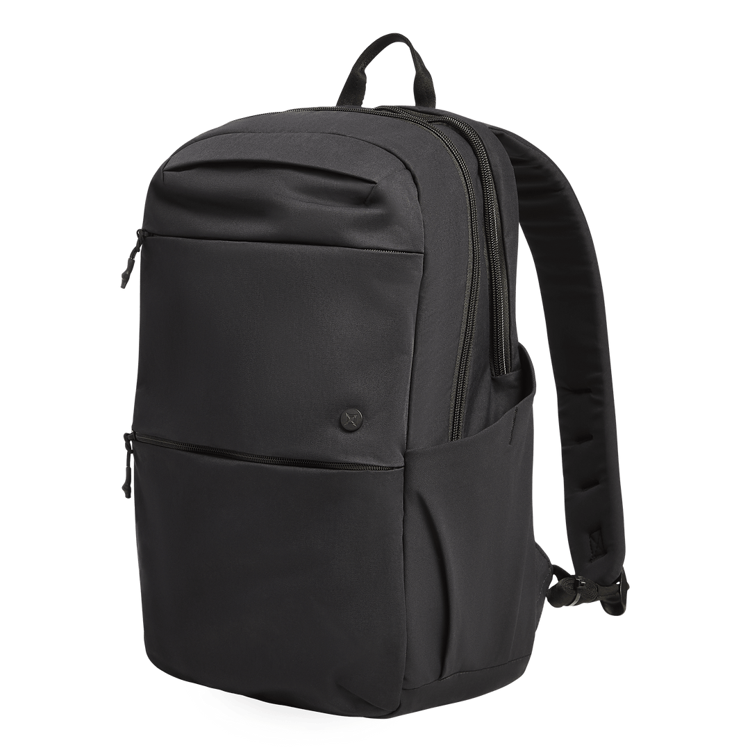 The Vertx Any Day Backpack by Vertx in black features two zippered compartments, a front pocket, side pockets, padded straps, a top handle, and is CCW-ready and ballistic-panel compatible. Displayed on a plain white background.