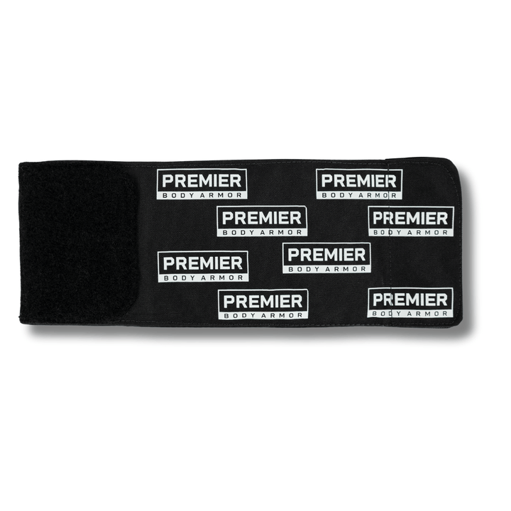 A black fabric strap with a Velcro section on the left, covered in white-and-black "Premier Body Armor" logo patches—a perfect fit for your Premier Body Armor Bulletproof Can Cooler - Limited Edition.