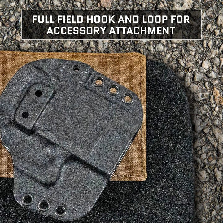 A close-up of a black attachment panel on rough ground shows multiple holes with a textured finish. Above it, text reads: "Full field hook and loop for accessory attachment," ideal for integrating with your Viktos Upscale2 / Upscale3 Sling Level IIIA Backpack Insert by Premier Body Armor.