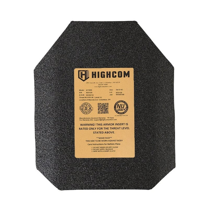 The Premier Body Armor Highcom AR1000 Guardian Level III+ Plate is a black hexagonal ballistic plate with a tan label on the front showing manufacturer info, product details, and warnings. "HIGHCOM," reflects its NIJ 0101.06 certification and it's made from ultra-high hardness steel for superior protection.