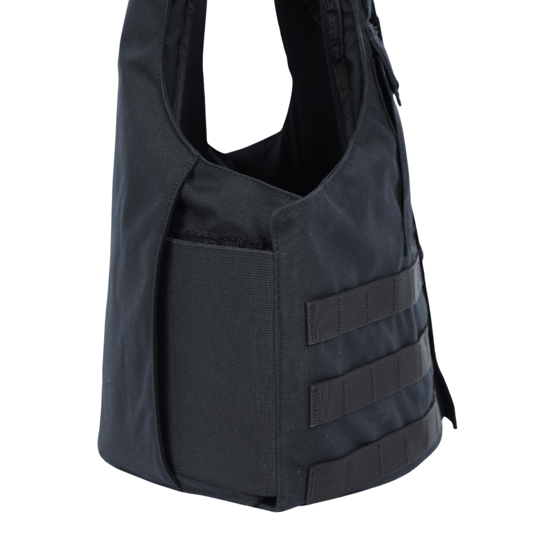 A close-up of the Premier Body Armor Patrol Bravo vest shows its black elastic side panel and three rows of horizontal webbing, designed for a comfortable fit with Level IIIA soft armor.