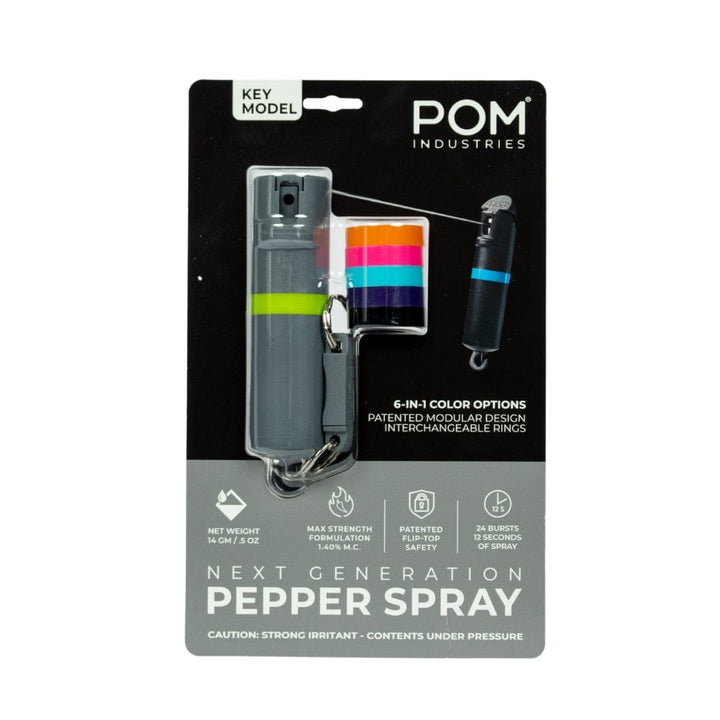 The POM Keychain Pepper Spray by POM features interchangeable color rings, safety lock, maximum strength formula, 10–12 bursts, and a quick-release keychain—making it a compact and reliable self-defense tool.