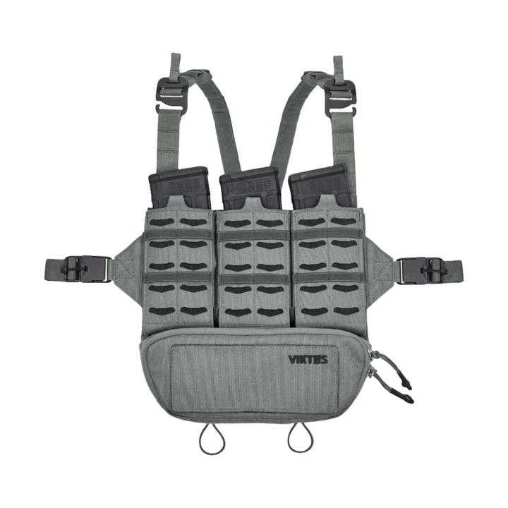 The Viktos Taculus MX Chest Rig in gray features adjustable straps, a front pouch, and multiple compartments. The middle section holds three black magazines. The brand name "VIKTOS" is prominently displayed on the lower pocket, highlighting its design for tactical operations.