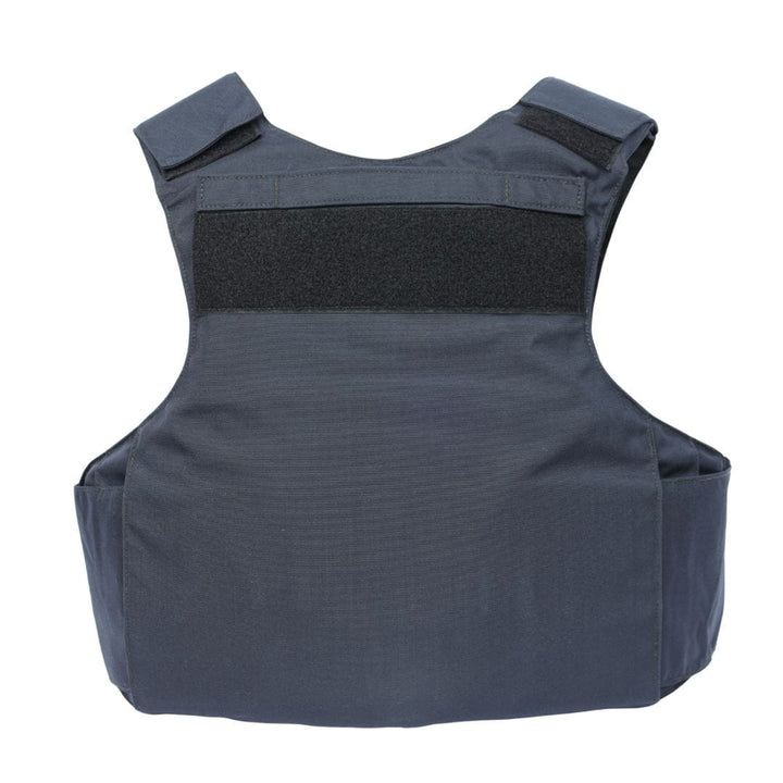 The Premier Body Armor Rapid Duty Vest is shown from the back, with wide shoulder straps, a black horizontal patch near the top, and a simple, smooth dark-colored fabric design.