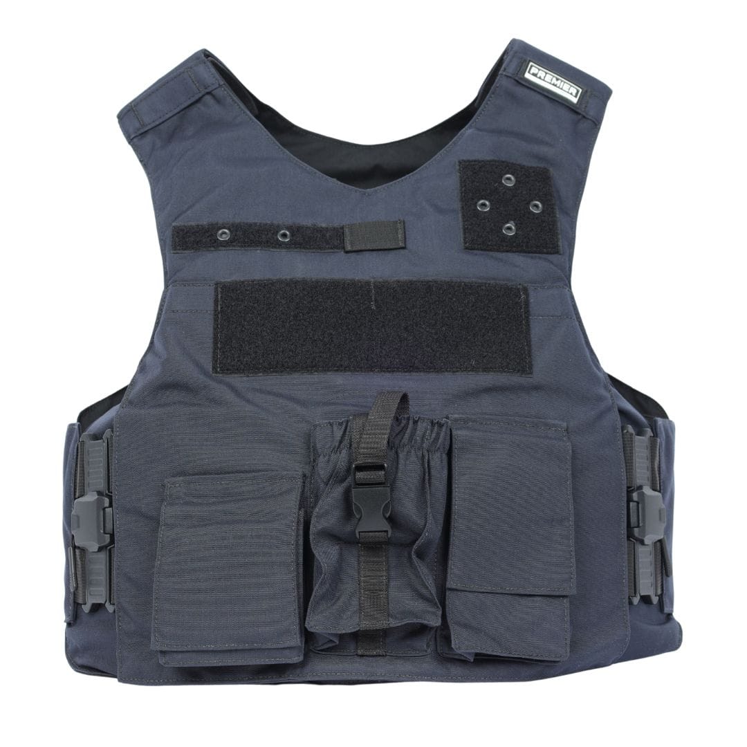The Premier Body Armor Rapid Duty Vest is black, features multiple pouches, adjustable side straps, Velcro chest panels, and has a small label on the upper right shoulder.