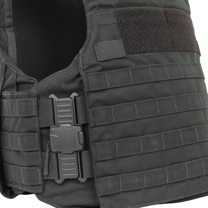 Close-up of the Premier Body Armor Rapid Duty Vest in black, featuring adjustable straps, a quick-release buckle, horizontal webbing for gear attachment, and a Velcro patch area near the shoulder.
