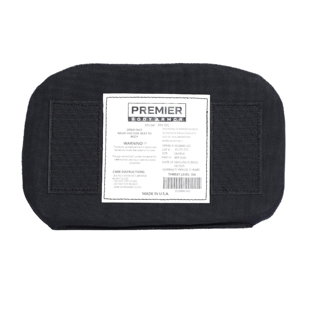 Black body armor panel with a visible label on a white background