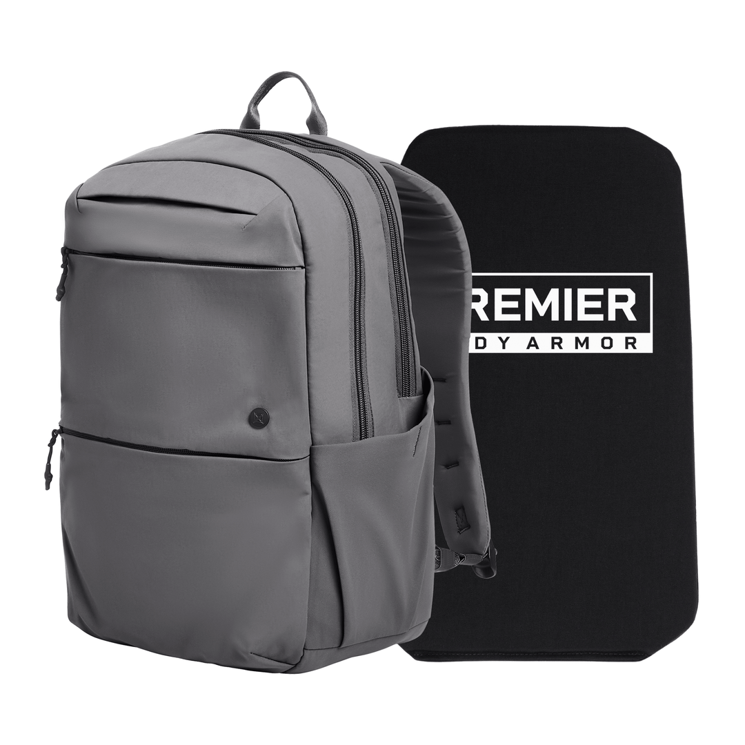 A gray Armored Vertx Any Day Backpack Bundle by Vertx/Premier is displayed next to a Level IIIA ballistic insert, designed to fit inside the backpack for enhanced security.