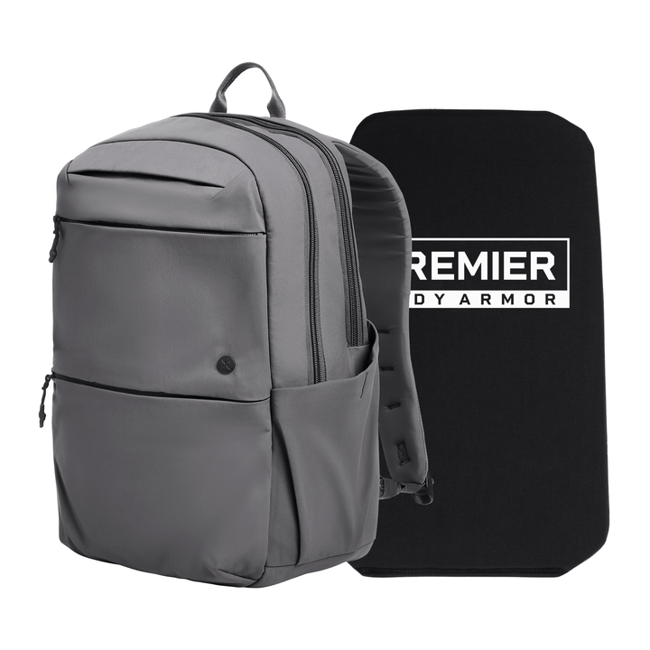 A gray Armored Vertx Any Day Backpack Bundle by Vertx/Premier is displayed next to a Level IIIA ballistic insert, designed to fit inside the backpack for enhanced security.