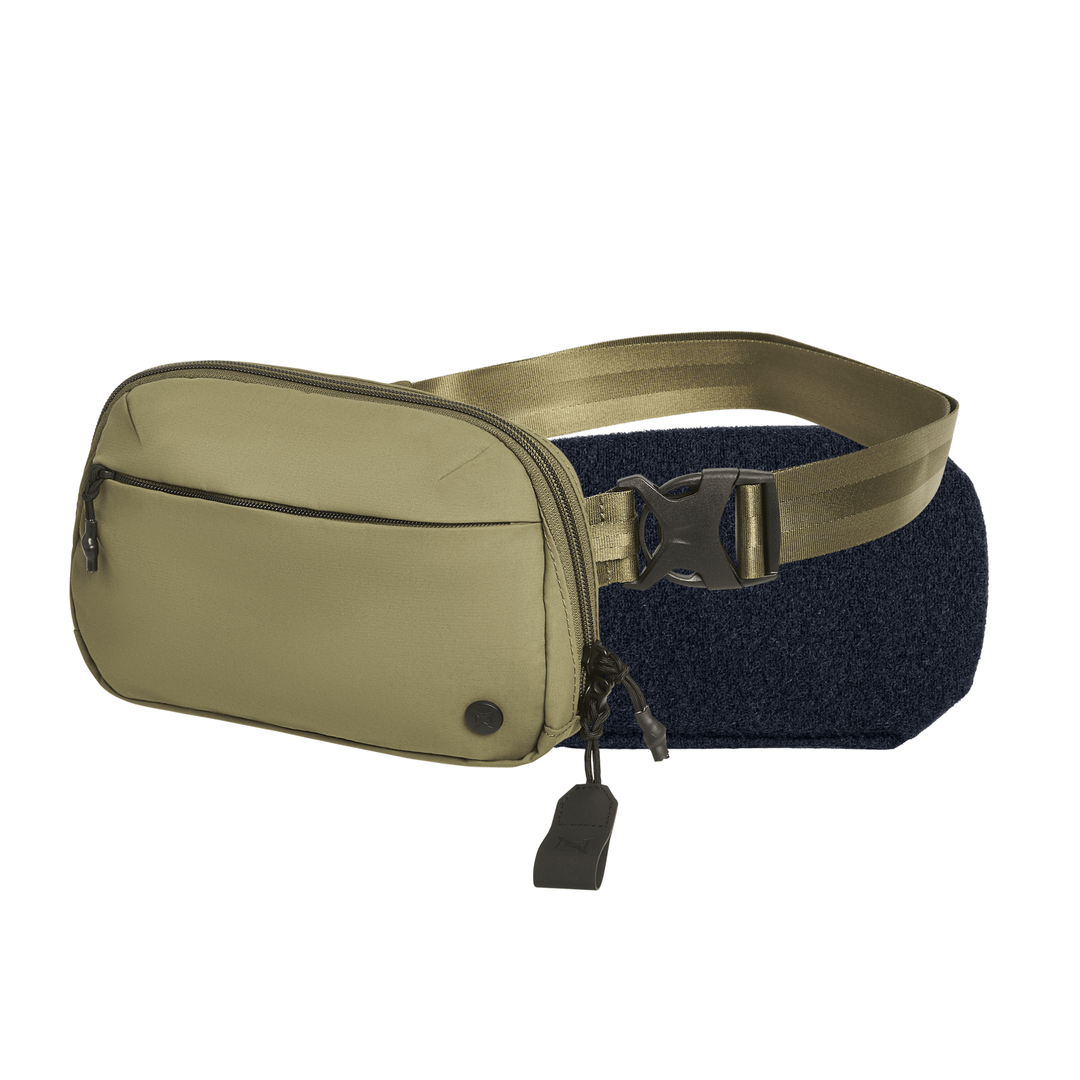 The Armored Vertx Everyday Fanny Pack 2.1 Bundle by Vertx/Premier is a khaki waist bag with a large front zip pocket, small zip pocket, and an adjustable olive-green strap with black buckle, shown on a white background.