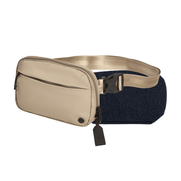 The Armored Vertx Everyday Fanny Pack 2.1 Bundle by Vertx/Premier features a beige CCW design, black adjustable strap, front zip pocket, and small black tab—ideal for daily use—shown here against a white background.