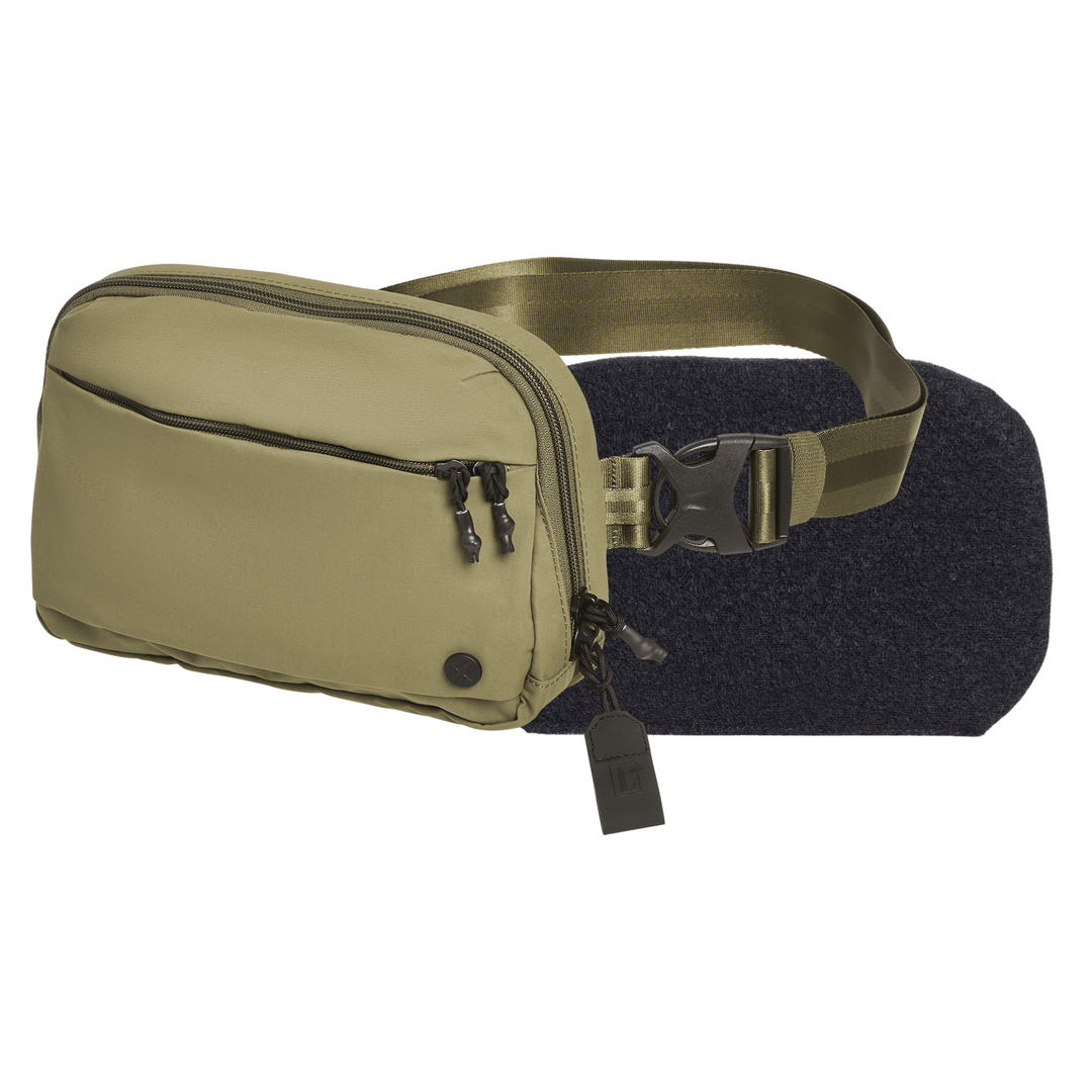 The Vertx/Premier Armored Vertx Everyday Fanny Pack+ Bundle offers Level IIIA protection, a black adjustable strap, external zip pocket, and small black tag on the main zipper—perfect for secure CCW carry.