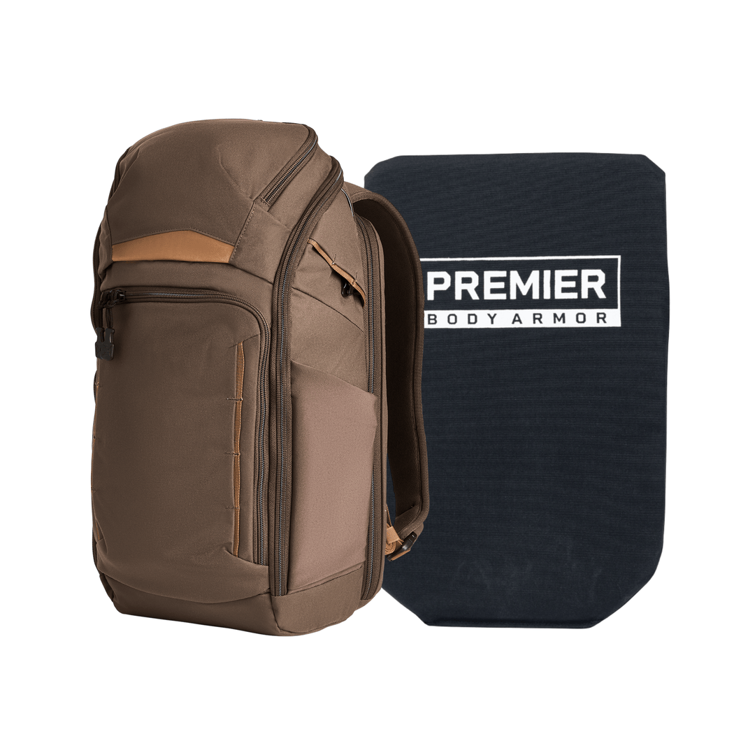 A brown and tan Armored Vertx Gamut 22L Pack Bundle by Vertx/Premier sits beside a rectangular black Premier Body Armor soft panel labeled in white.