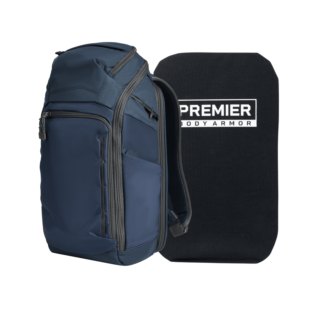 A blue Vertx/Premier Armored Vertx Gamut 26L Pack Bundle with multiple zippered compartments is shown next to a rectangular black Level IIIA insert labeled "Premier Body Armor" for concealed handgun protection.