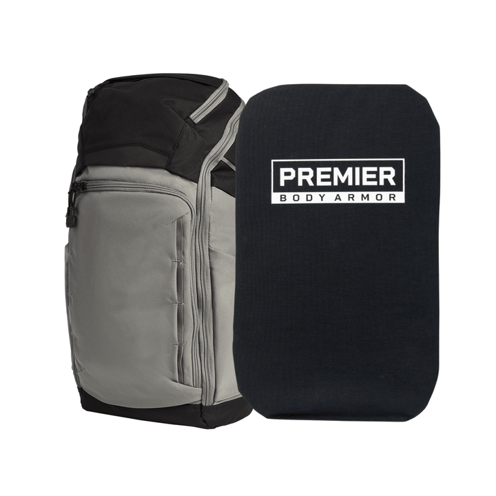 A gray and black Armored Vertx Gamut 26L Pack Bundle by Vertx/Premier stands upright beside a rectangular black Level IIIA insert labeled "Premier Body Armor," providing discreet concealed handgun protection.