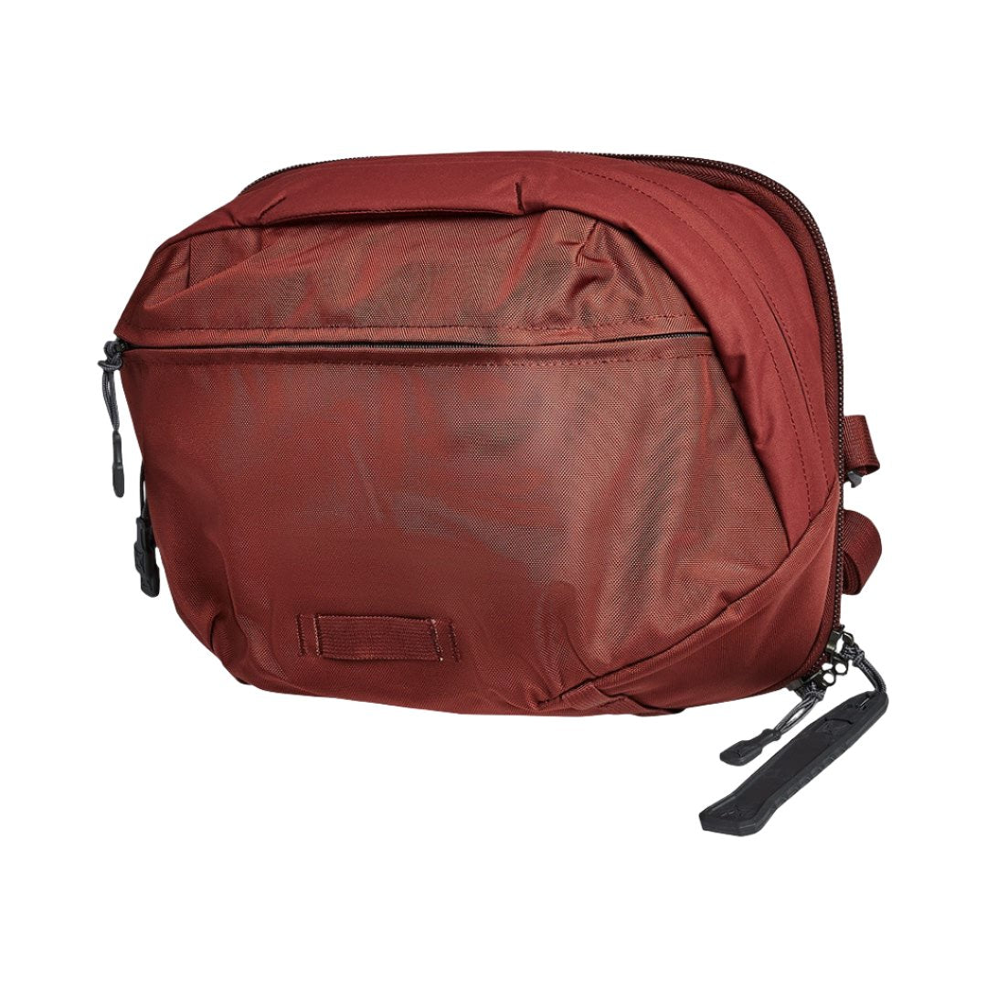 Image of Vertx Navigator Sling in Red. The perfect travel bag for EDC gear. Add backpack body armor to the Vertx Navigator. 