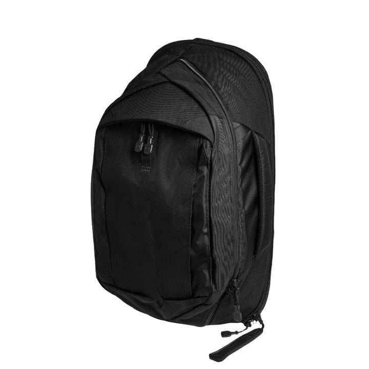 Side image of the Vertx Commuter Sling 3.0 in it's black. The best crossbody sling bag for concealed carry. 