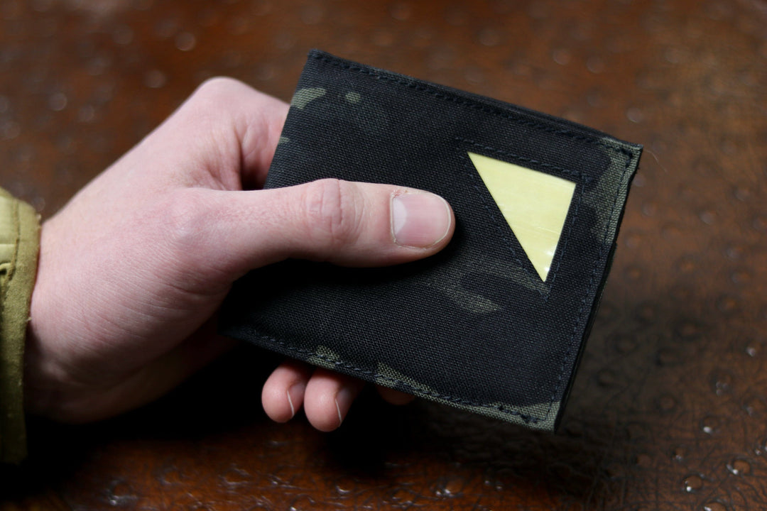 lifestyle picture of black multicam bulletproof wallet